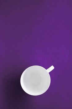 Kitchen, table decor and drinks menu concept - White tableware crockery set, empty cup on purple flatlay background