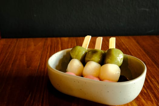 Color Dango in ceramic bowl Japanese dumping good tesr food travel cuisine