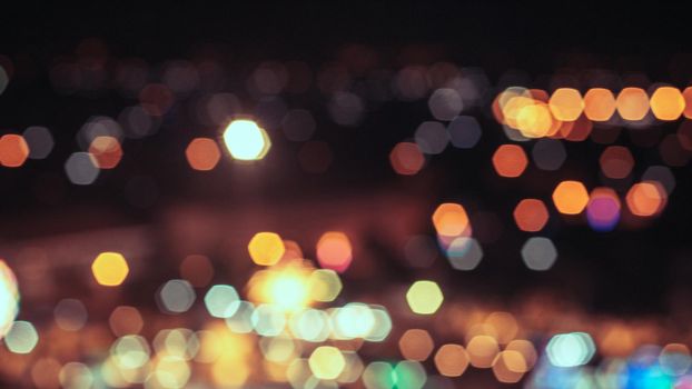 Bokeh city lights background. Bokeh of cityscape skyline during evening dark blue sunset, dusk twilight