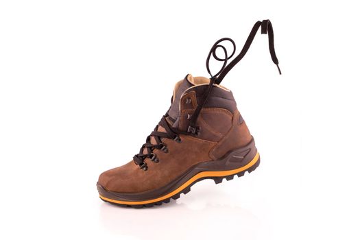 Pair of walking man brown hiking boots, isolate on a white background