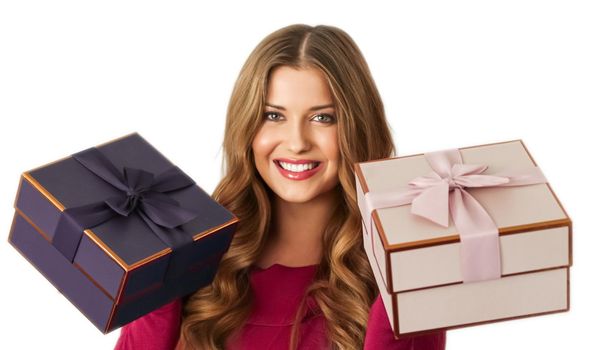 Birthday, Christmas gifts or holiday present, happy woman holding gift boxes isolated on white background, portrait