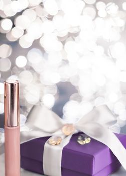 Cosmetic branding, Christmas glitter and girly blog concept - Holiday make-up foundation base, concealer and purple gift box, luxury cosmetics present and blank label products for beauty brand design