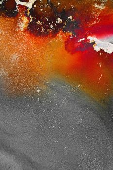 Burning abstract background from marble ink art of exquisite original painting . Painting was painted on high quality paper texture to create smooth marble background pattern of ombre alcohol ink .