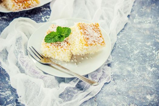 Cakes in coconut shavings. Selective focus. Food.