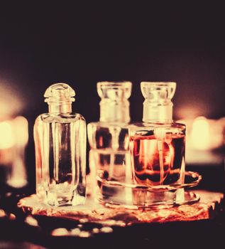 Perfumery, cosmetic branding and spa concept - Perfume bottles and vintage fragrance at night, aroma scent, fragrant cosmetics and eau de toilette as luxury beauty brand, holiday fashion parfum design