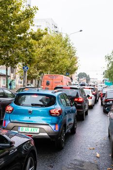 Car traffic at rush hour. Car pollution, traffic jam in Bucharest, Romania, 2022