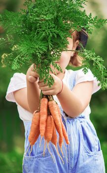 Child and vegetables on the farm. Selective focus. nature.