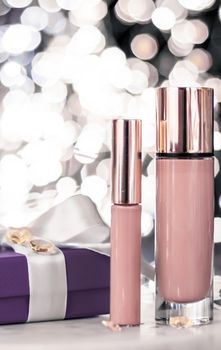 Cosmetic branding, Christmas glitter and girly blog concept - Holiday make-up foundation base, concealer and purple gift box, luxury cosmetics present and blank label products for beauty brand design