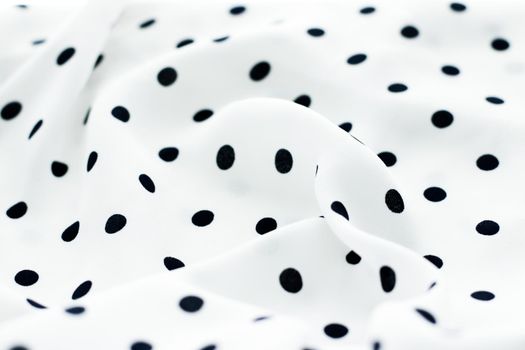 Fashion design, interior decor and vintage material concept - Classic polka dot textile background texture, black dots on white luxury fabric design pattern