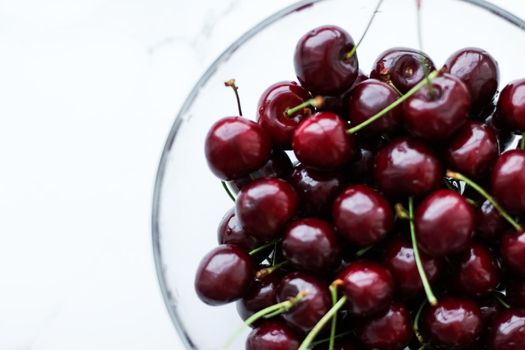 Organic food, vegan dieting and health concept - Fresh sweet cherries, juicy cherry berries fruit dessert as healthy diet background