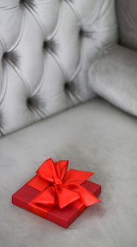 Wedding present, shop sale promotion and love celebration concept - Luxury holiday red gift box with silk ribbon and bow, christmas or valentines day decor