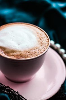 Menu, branding and recipe concept - Cup of cappuccino for breakfast with satin and pearls jewellery background, organic coffee with lactose free milk in parisian cafe for luxury vintage holiday brand