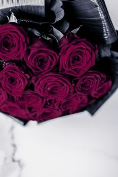 Gift for her, romantic relationship and floral design concept - Luxury bouquet of maroon roses on marble background, beautiful flowers as holiday love present on Valentines Day