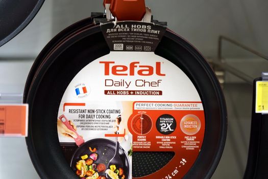 Tyumen, Russia-September 24, 2022: Pan Tefal and Cookware set collection for sell in the supermarket. Choosing a home product