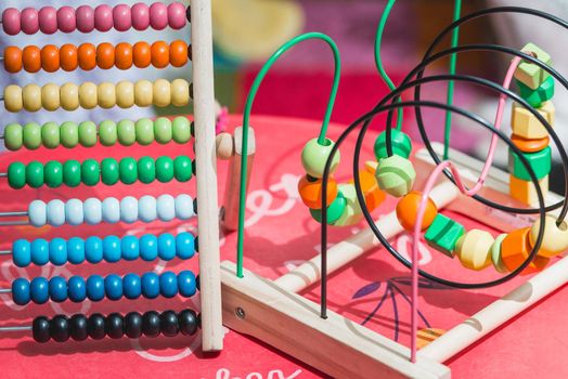 Colourfull wooden abacus. Educational concept for kids. Learing to count. Wooden Toys ,intelligent game for kids.