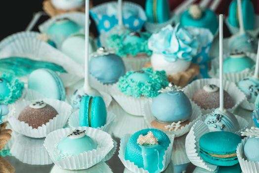Sweet almond colorful tiffany colored blue macaron or macaroon dessert cake. French sweet cookie. Minimal food bakery concept.