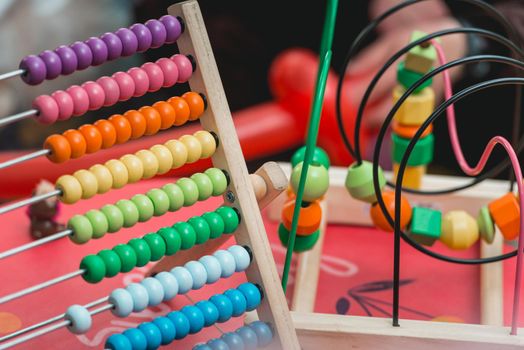 Colourfull wooden abacus. Educational concept for kids. Learing to count. Wooden Toys ,intelligent game for kids