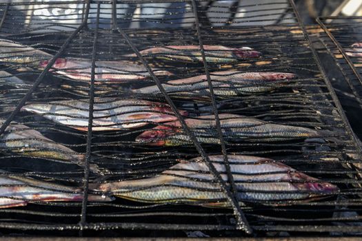 Herring on the grill on a street market