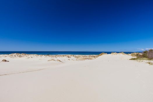 The popular Peron Dunes with 4WD driving in Akaroa, near St Helens in Tasmania, Australia