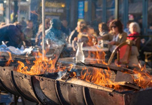 Bonfire with firewood in the restaurant