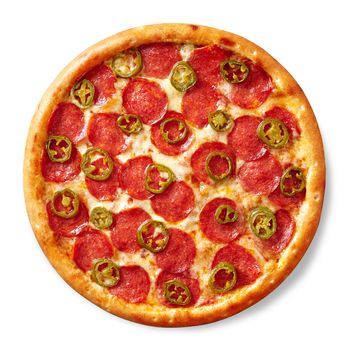 Top view of delicious spicy pizza with thinly sliced pepperoni, tomato sauce, mozzarella cheese and chopped jalapeno peppers isolated on white background. Italian cuisine