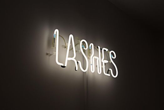 Shining Lashes white Neon Label. advertising for a beauty salon