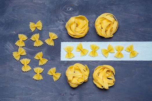 Pasta with durum wheat. Food for vegans. Proper nutrition, healthy food. Gray background