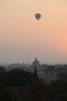 hot air balloon with pagoda in bagan