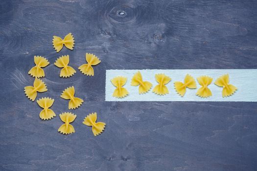 Pasta with durum wheat. Food for vegans. Proper nutrition, healthy food. Gray background