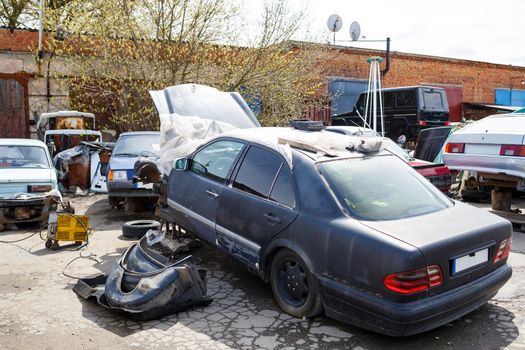 old car, rusty broken body, abandoned parking