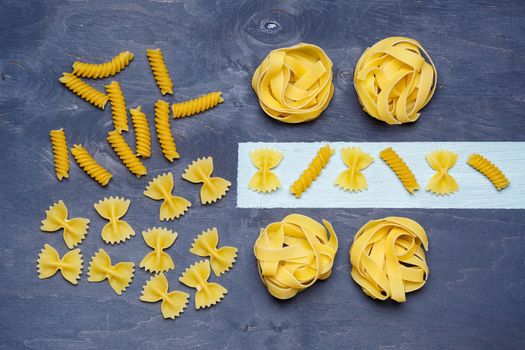 Pasta with durum wheat. Food for vegans. Proper nutrition, healthy food. Gray background