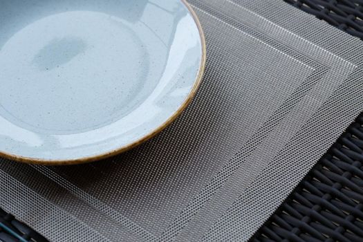 Empty plate of blue glaze ceramic melamine for dinner.
