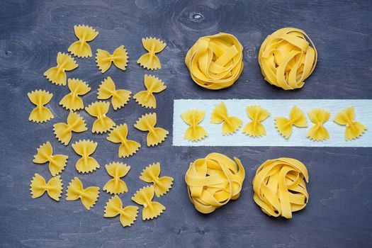 Pasta with durum wheat. Food for vegans. Proper nutrition, healthy food. Gray background