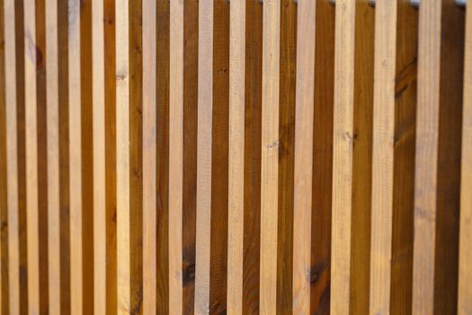 Wall made of wooden slats, natural materials for renovation