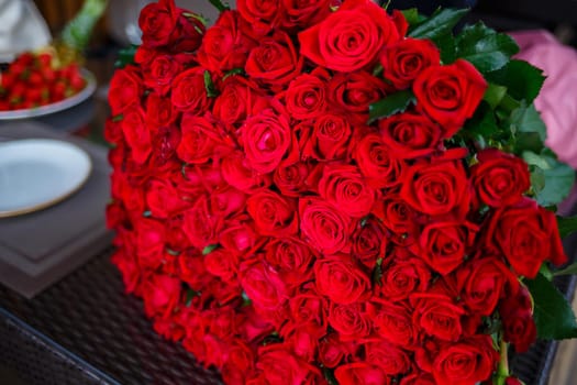 A large bouquet of red roses for a girl, fresh flowers