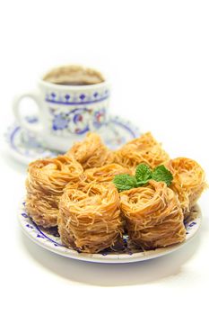 Eastern sweetness, baklava with peanuts and honey. Isolate. Selective focus. Food.