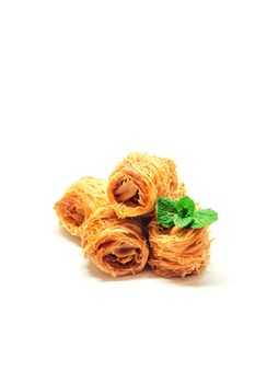 Eastern sweetness, baklava with peanuts and honey. Isolate. Selective focus. nature