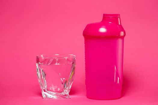 pink shaker, glass of water, colored background, sports, energy drink