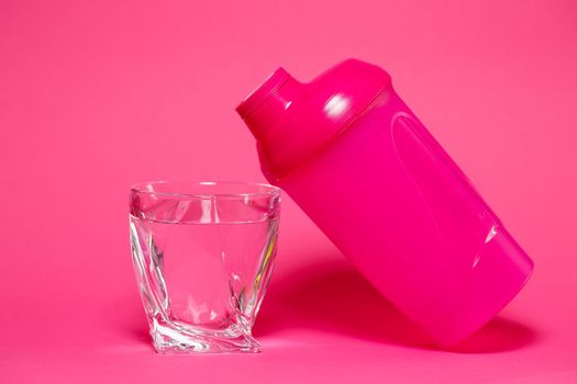 pink shaker, glass of water, colored background, sports, energy drink, gym equipment