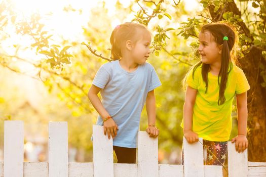 Two Little Girls Having Fun in the Park