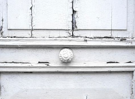 Vintage grated white wooden door with handle background, texture.