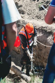 Mechanical engineer checking and inspect gas concentration in a place of possible outflow. maintenance services.