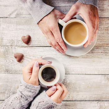 A cup of coffee. Selective focus. Couple. Drink.