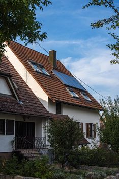 Traditional small house with beautiful outdoor decor facade in Germany. German old brick building house ancient European city German architect.