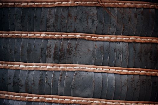 Scaly armor. Elements of plate armor of medieval warfare. metal plates, vintage scaly armor for body protection.