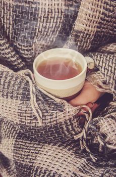 hot tea in the pot near the window. selective focus. drink.