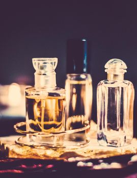 Perfumery, cosmetic branding and spa concept - Perfume bottles and vintage fragrance at night, aroma scent, fragrant cosmetics and eau de toilette as luxury beauty brand, holiday fashion parfum design