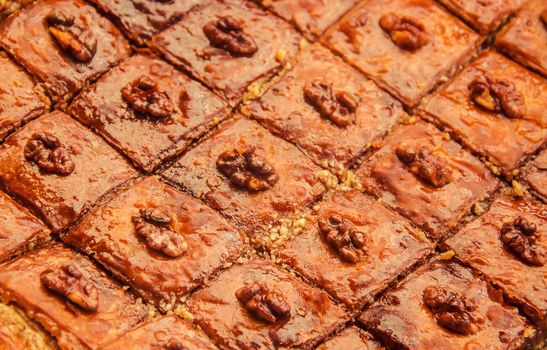 Baklava honey with walnuts. Selective focus. food.