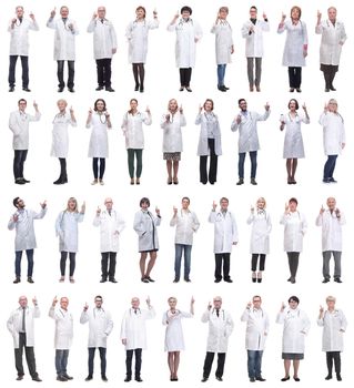 group of doctors in full length isolated on white background