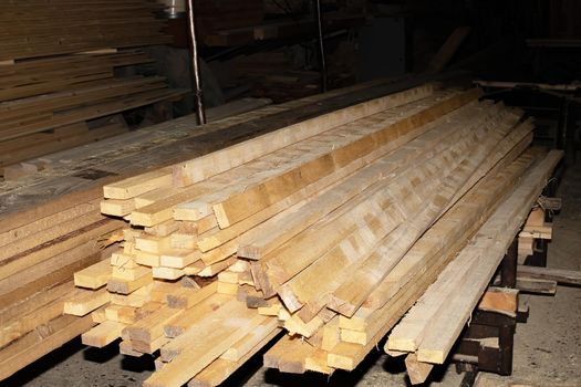 Folded finished boards at the sawmill close up